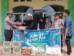 Polsek Pangkalan Kerinci Gelar Jumat Berkah, Santuni Anak Yatim Piatu