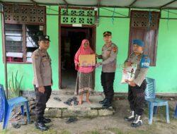 Ringankan Beban Warga, Polsek Bunut Berikan Bantuan Sembako