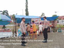 Polsek Bunut Laksanakan Patroli Pasar Ramadhan untuk Jaga Keamanan dan Ketertiban