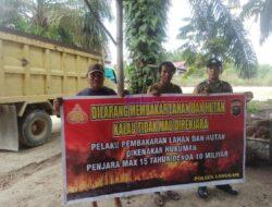 Polsek Langgam Laksanakan Sosialisasi Larangan Membakar Hutan dan Lahan