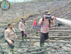 Kapolsek Ukui dan Tim Gabungan Amankan Lahan TNTN dari Kebakaran