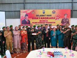 HUT Bhayangkara ke-79, Bupati Humbahas Didampingi Ketua TP. PKK Menyampaikan Ucapan Selamat