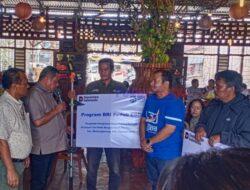 BRI Salurkan Mesin Potong Rumput untuk Petani Taput